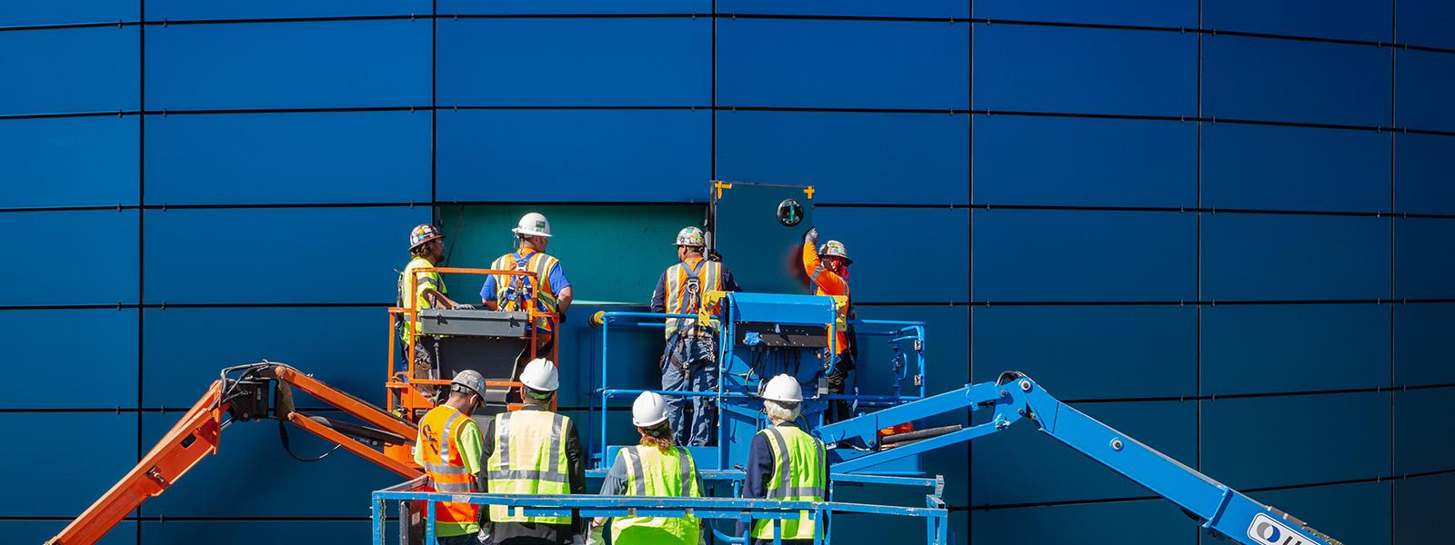 Final Piece of Glass is Installed on the Pacific Visions Wing
