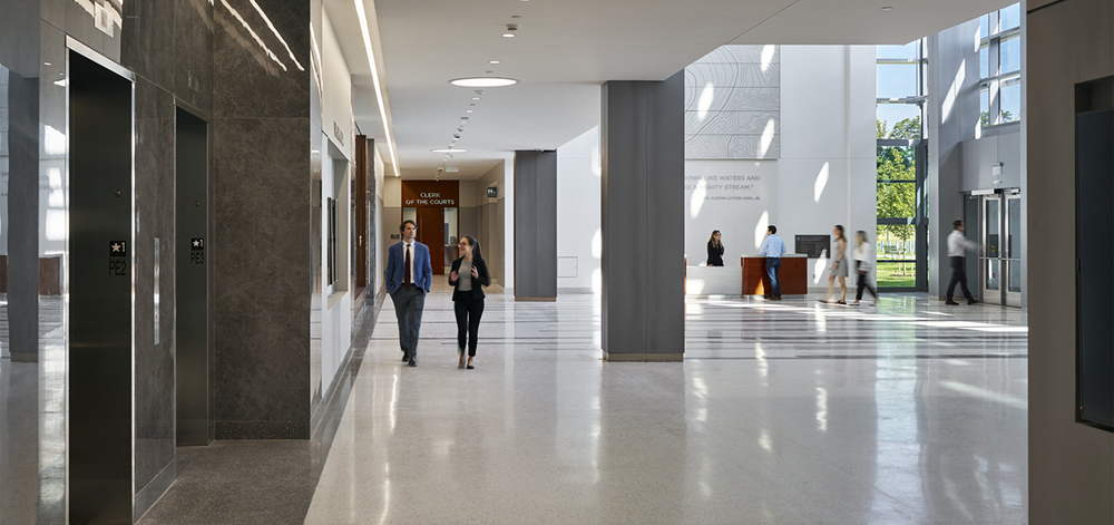 Citizens are welcomed into the building through a four-story day-lit atrium which enhances the sense of arrival.
