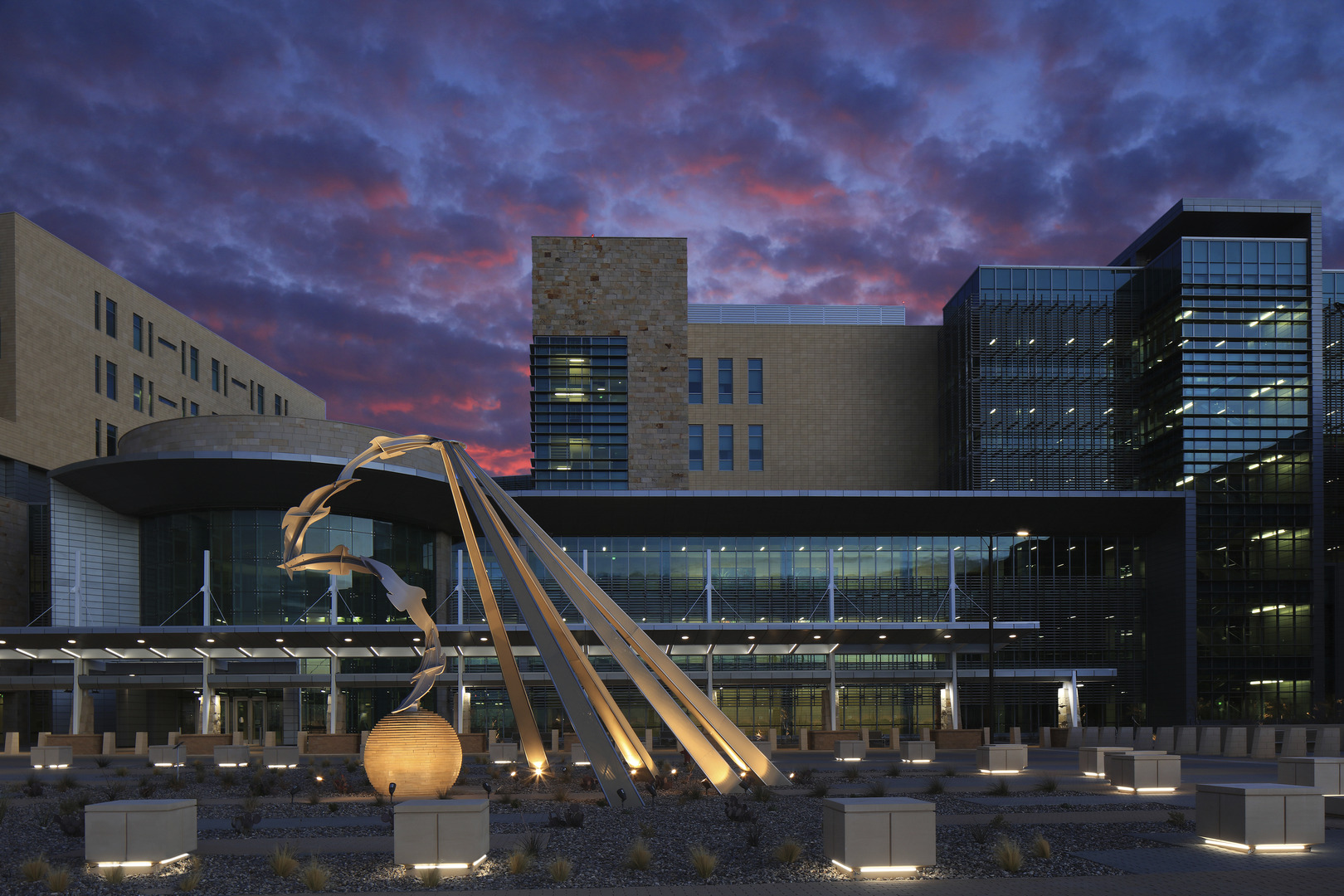 William Beaumont Army Medical center at night with purple clouds