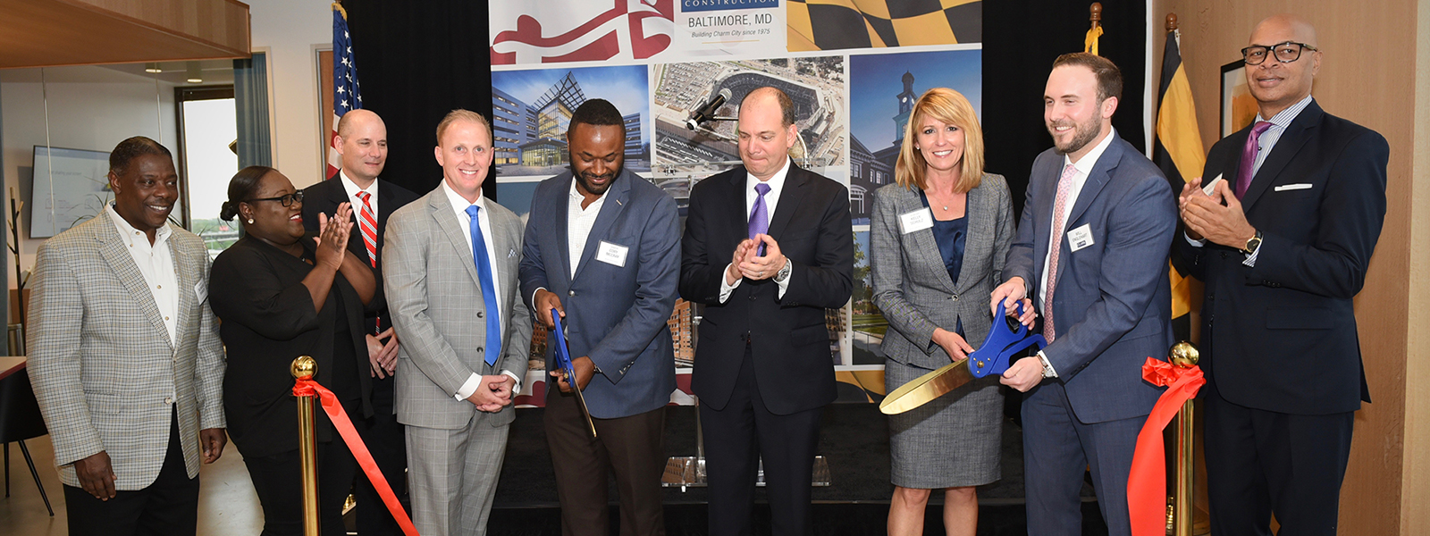 Clark Cuts Ribbon on New Baltimore Office 