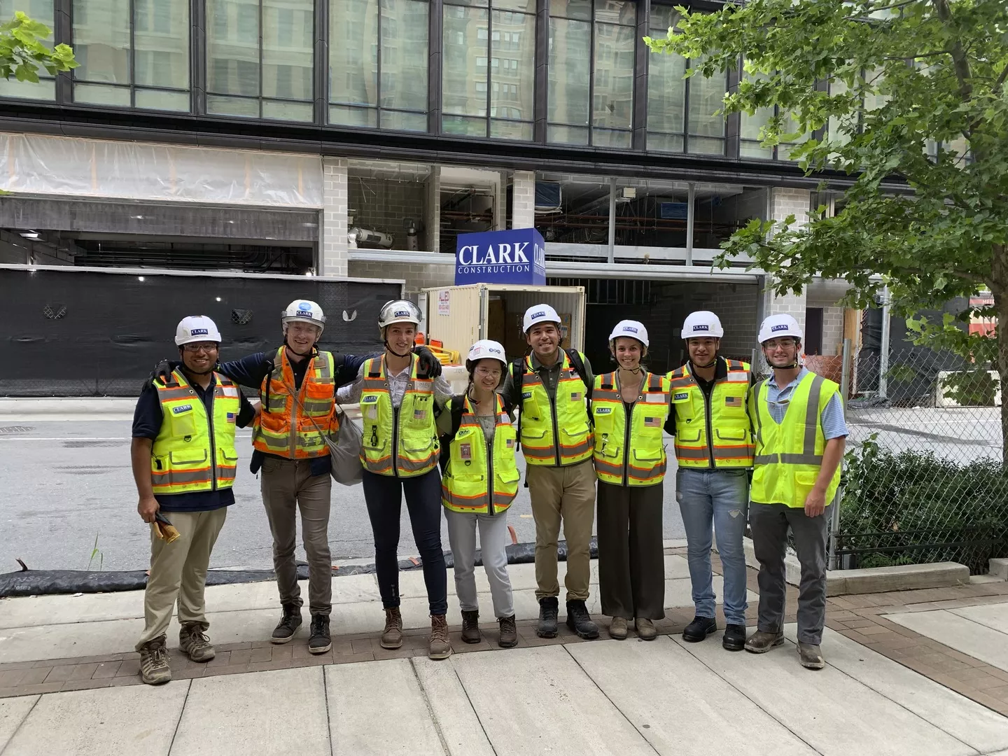 Clark summer associates in front of a jobsite