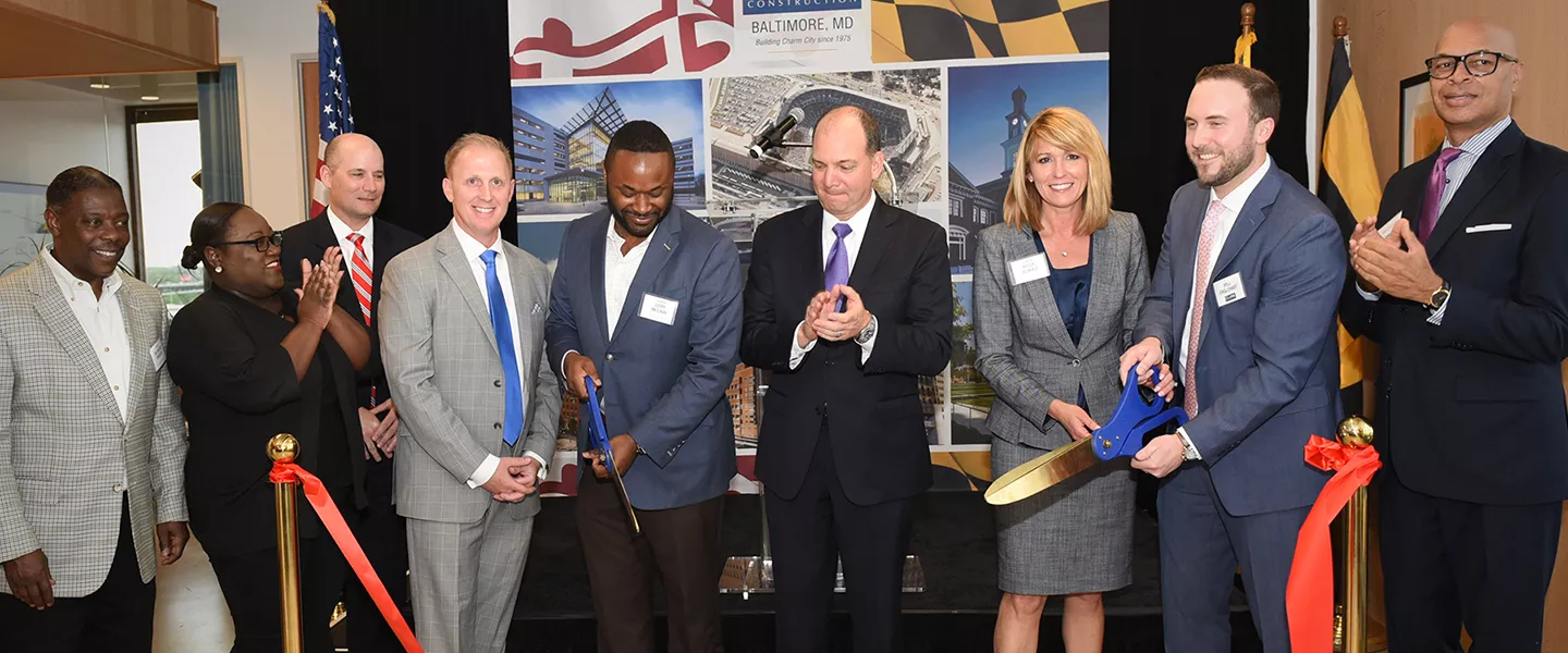 Clark Cuts Ribbon on New Baltimore Office 