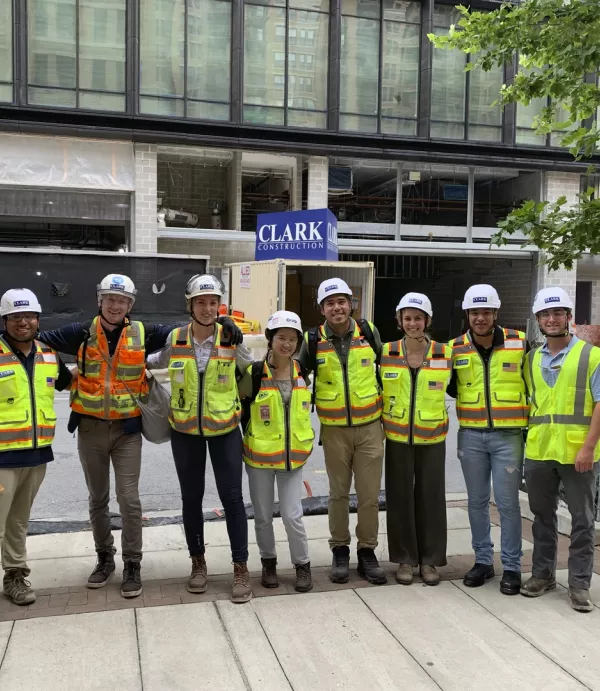 Clark summer associates in front of a jobsite