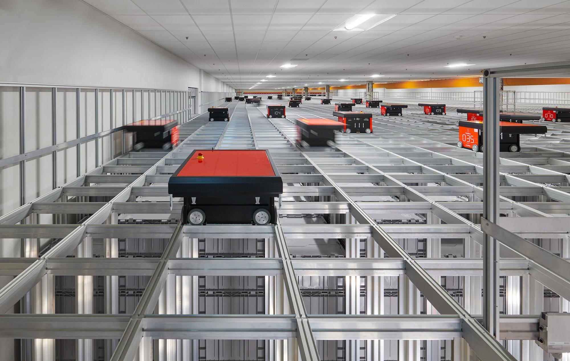 Inside the FBI's Central Records Complex in Winchester, Virginia, wheeled robots file away millions of paper records from FBI offices around the country