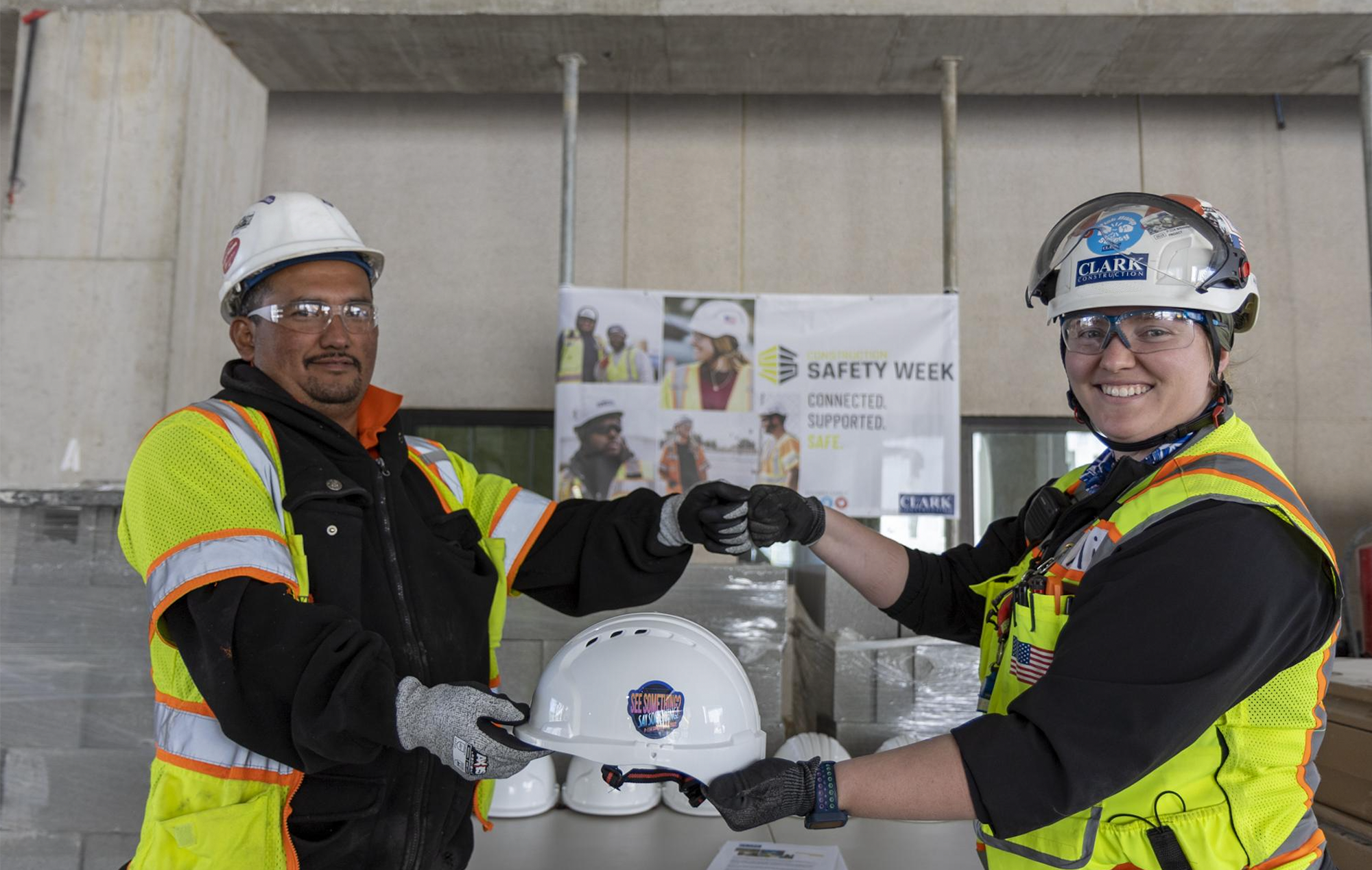 Trade contractor receives a safety helmet as part of Safety Week